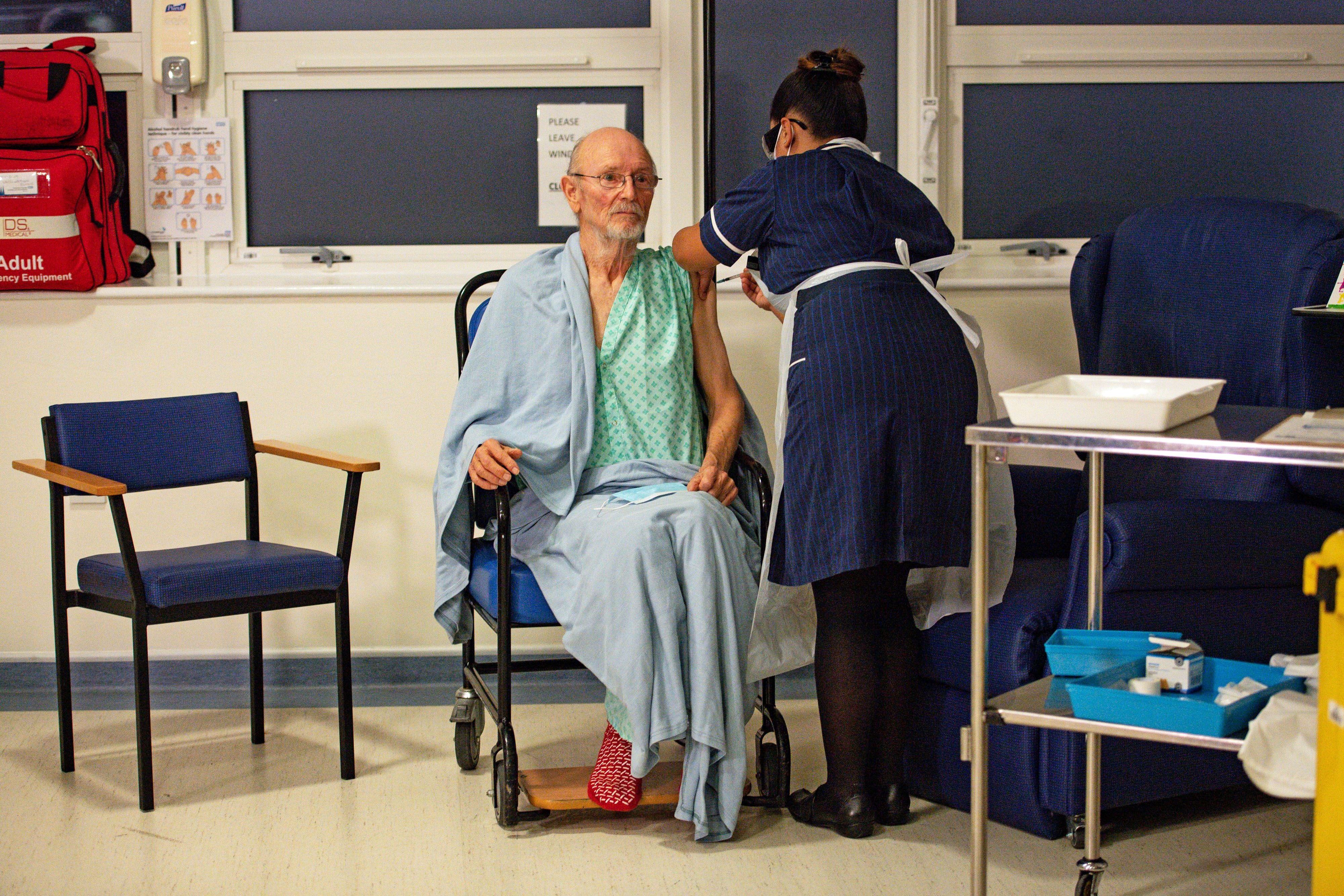 "Bill" William Shakespeare, 81, receives the Pfizer/BioNTech  COVID-19 vaccine at University Hospital in Coventry