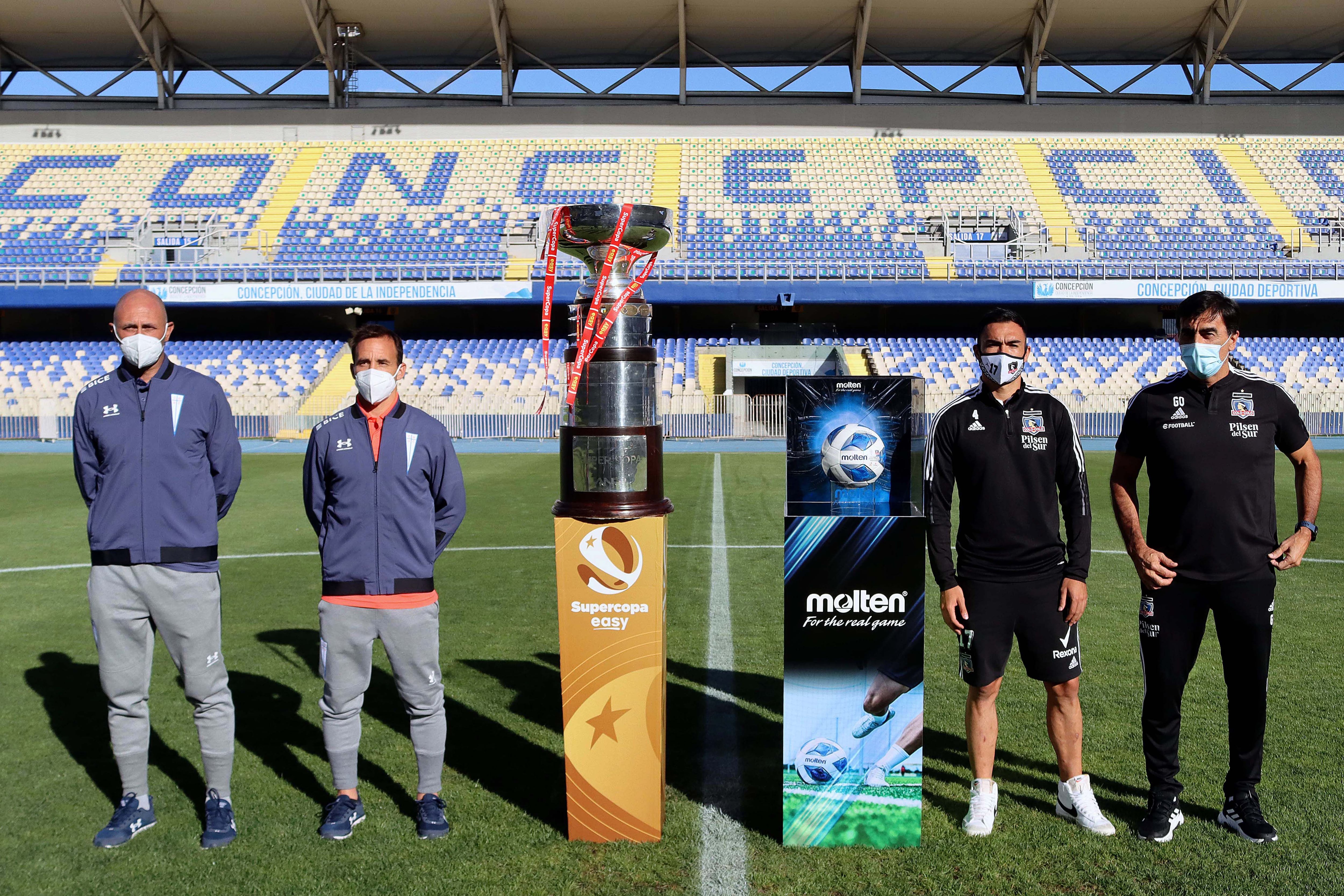 La UC y Colo Colo van por la Supercopa. En la imagen, Cristián Paulucci y José Pedro Fuenzalida por el lado de la UC; y Gabriel Suazo y Gustavo Quinteros por el de Colo Colo. Transmite El Deportivo.