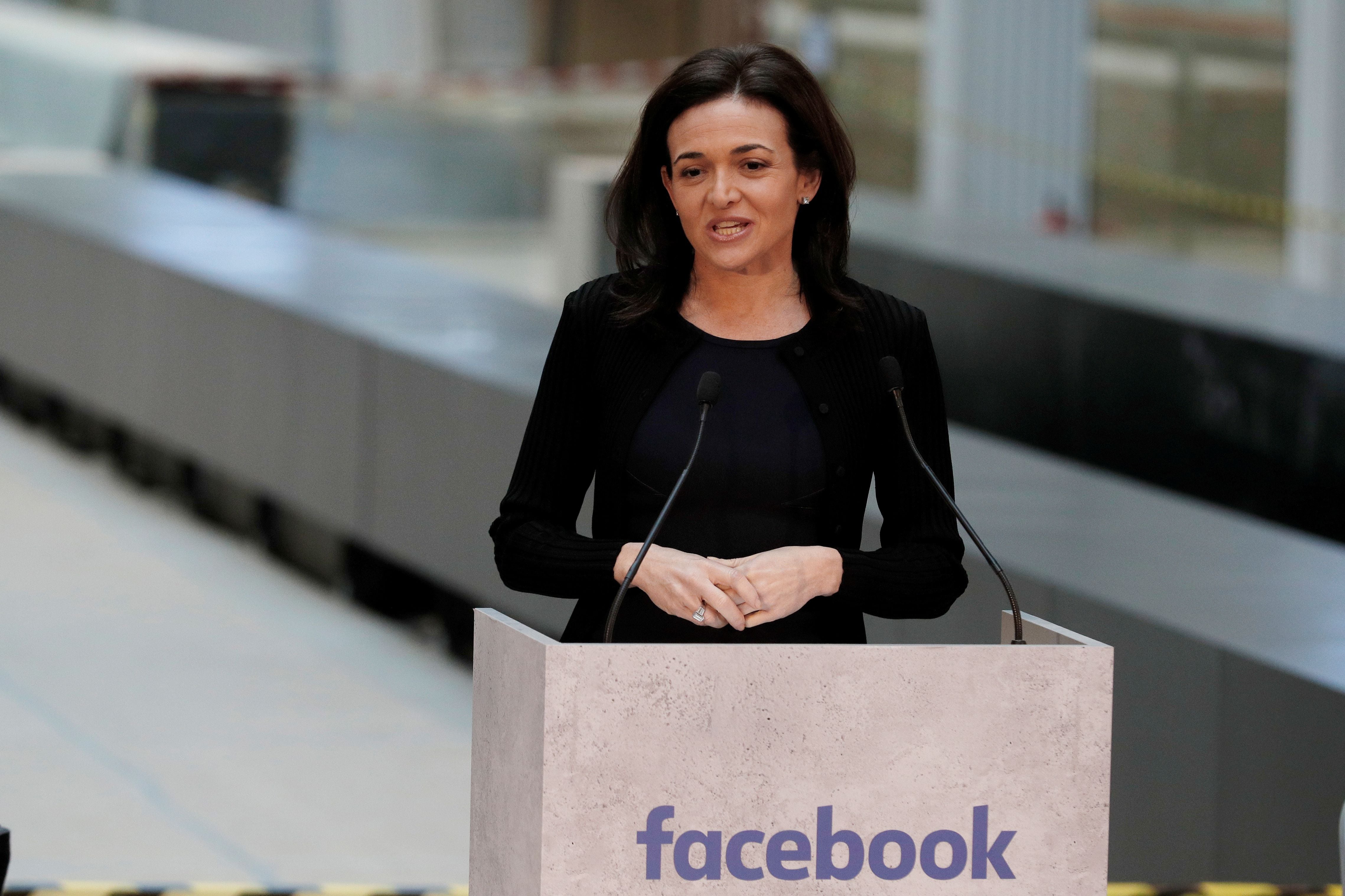 FILE PHOTO: Sheryl Sandberg, chief operating officer of Facebook, delivers a speech during a visit in Paris