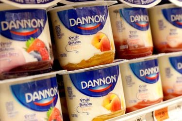FILE PHOTO: Containers of Danone's Dannon Yogurt are displayed in a supermarket in New York
