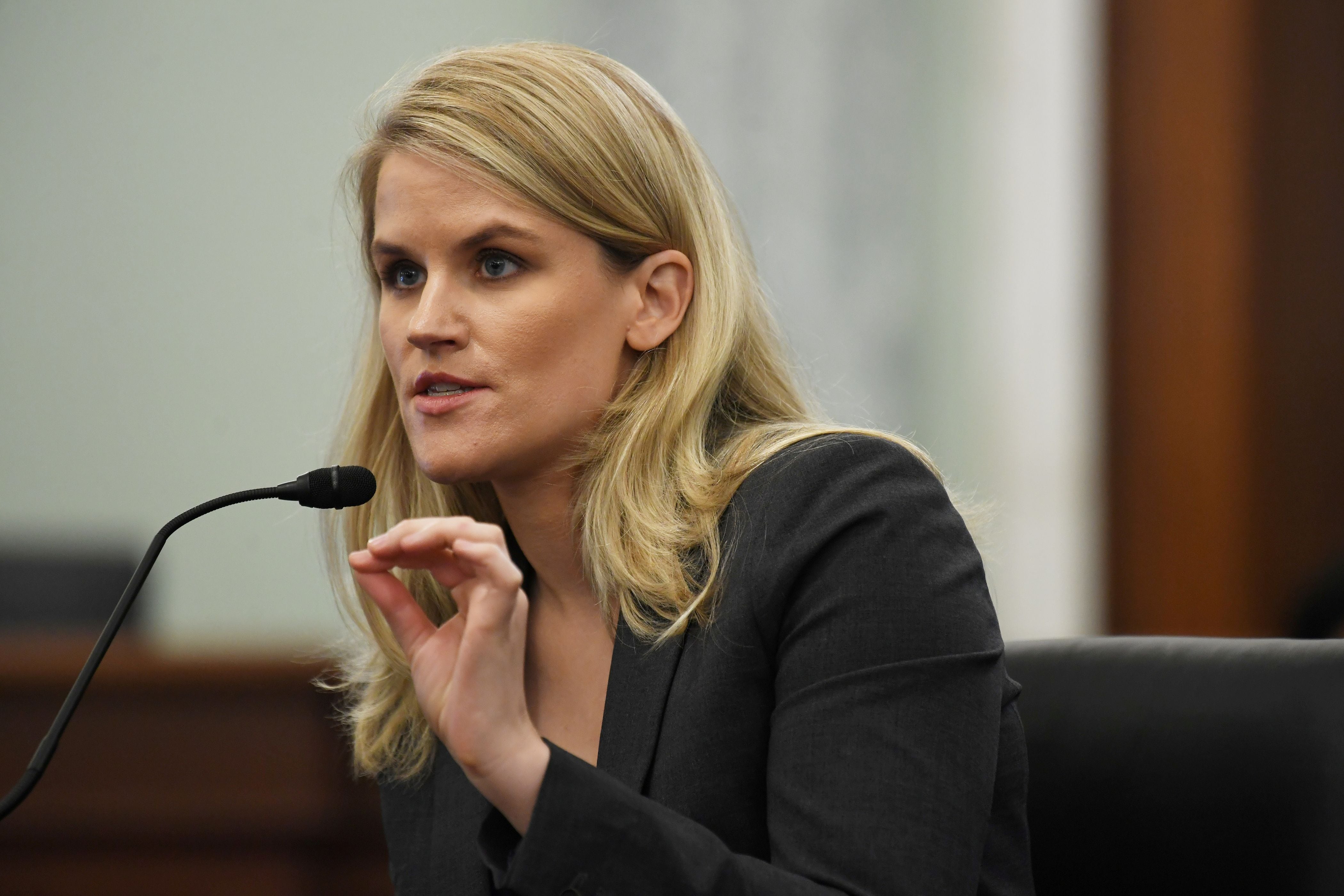 FILE PHOTO: Former Facebook employee and whistleblower Frances Haugen testifies during a hearing entitled 'Protecting Kids Online: Testimony from a Facebook Whistleblower' in Washington