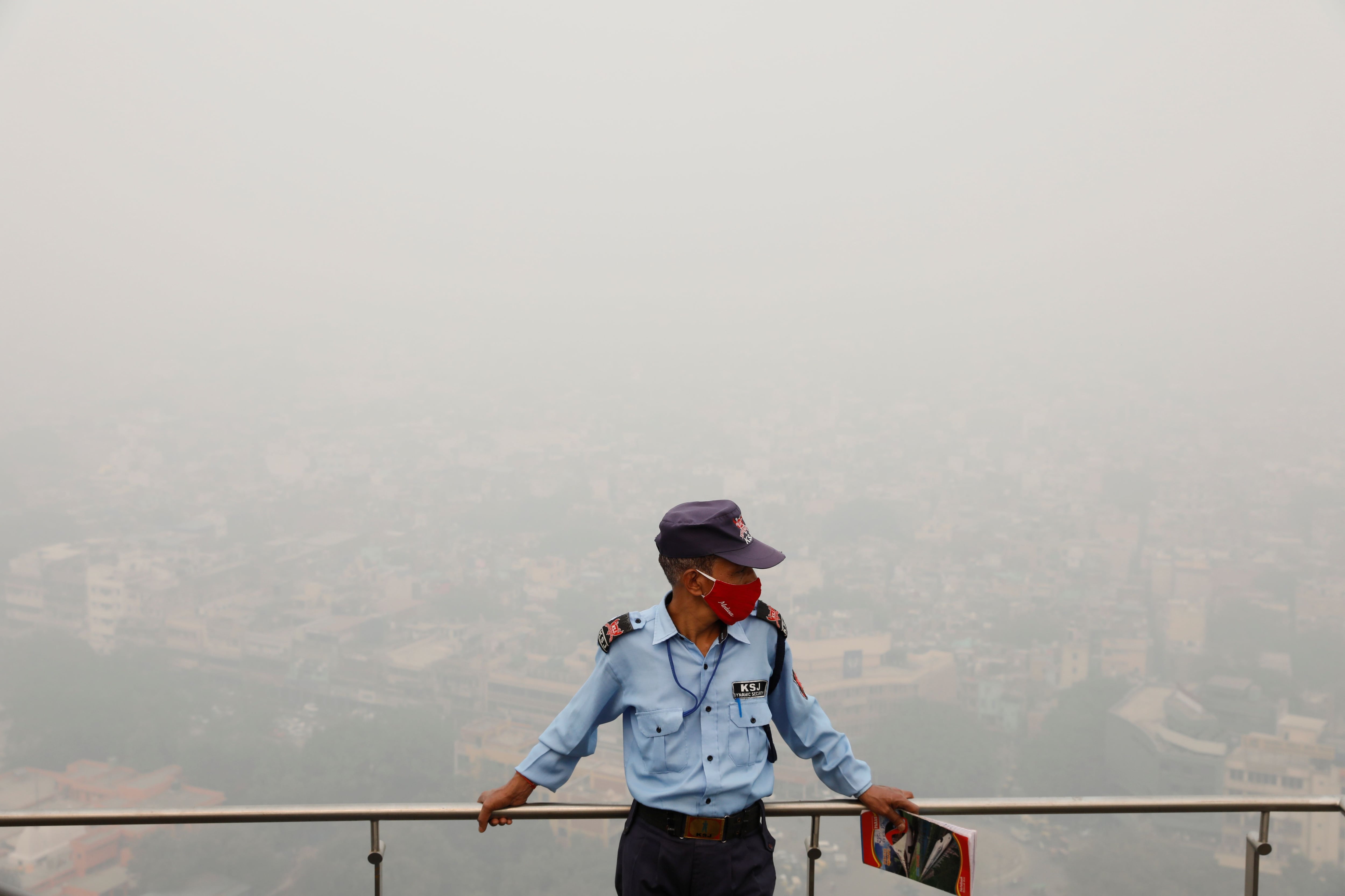 Buildings are seen shrouded in smog in New Delhi