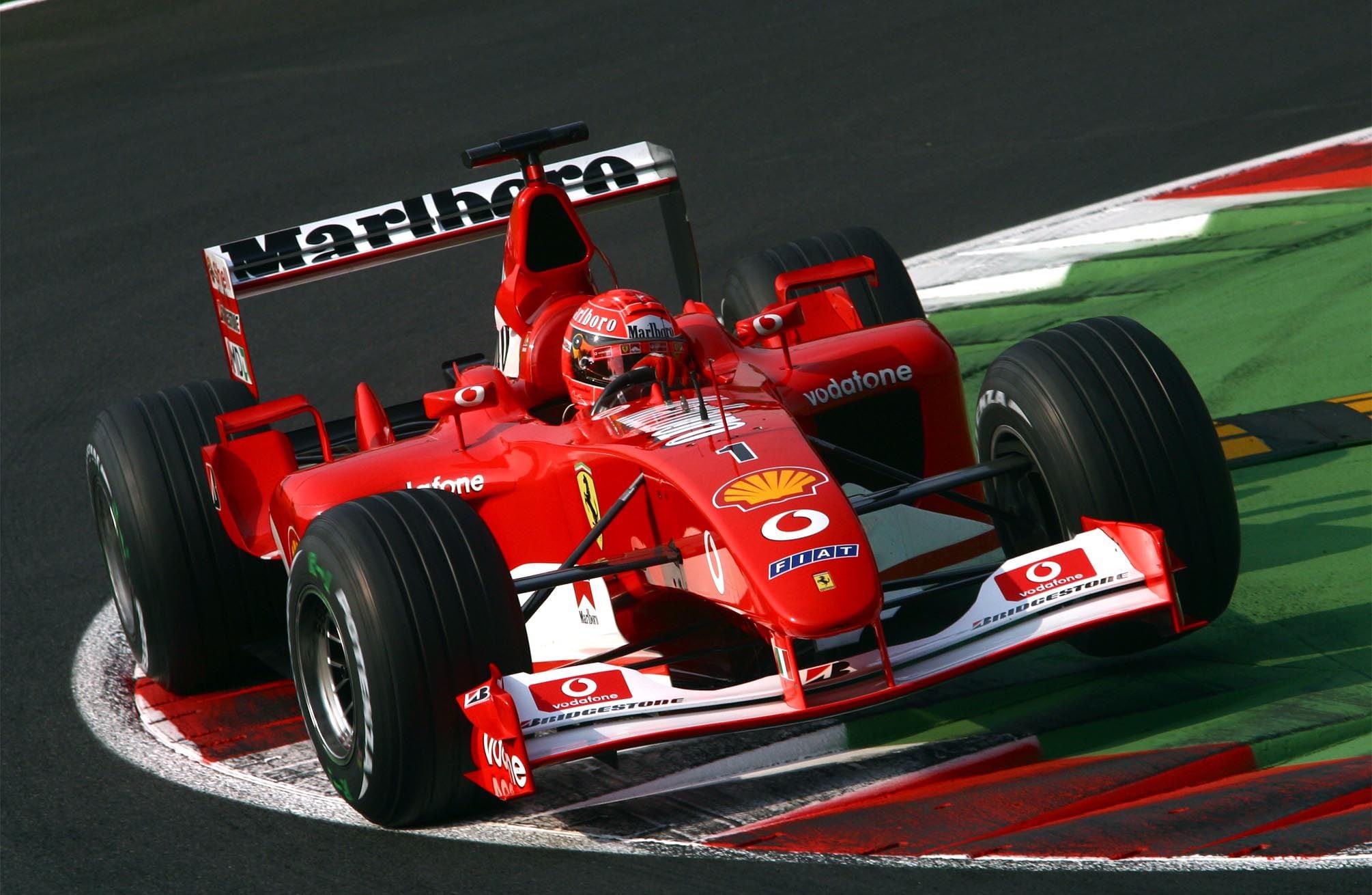 Michael-Schumacher-Ferrari-F2002-Italian-GP-F1-2002-Monza-chicane-Photo-Ferrari.jpg