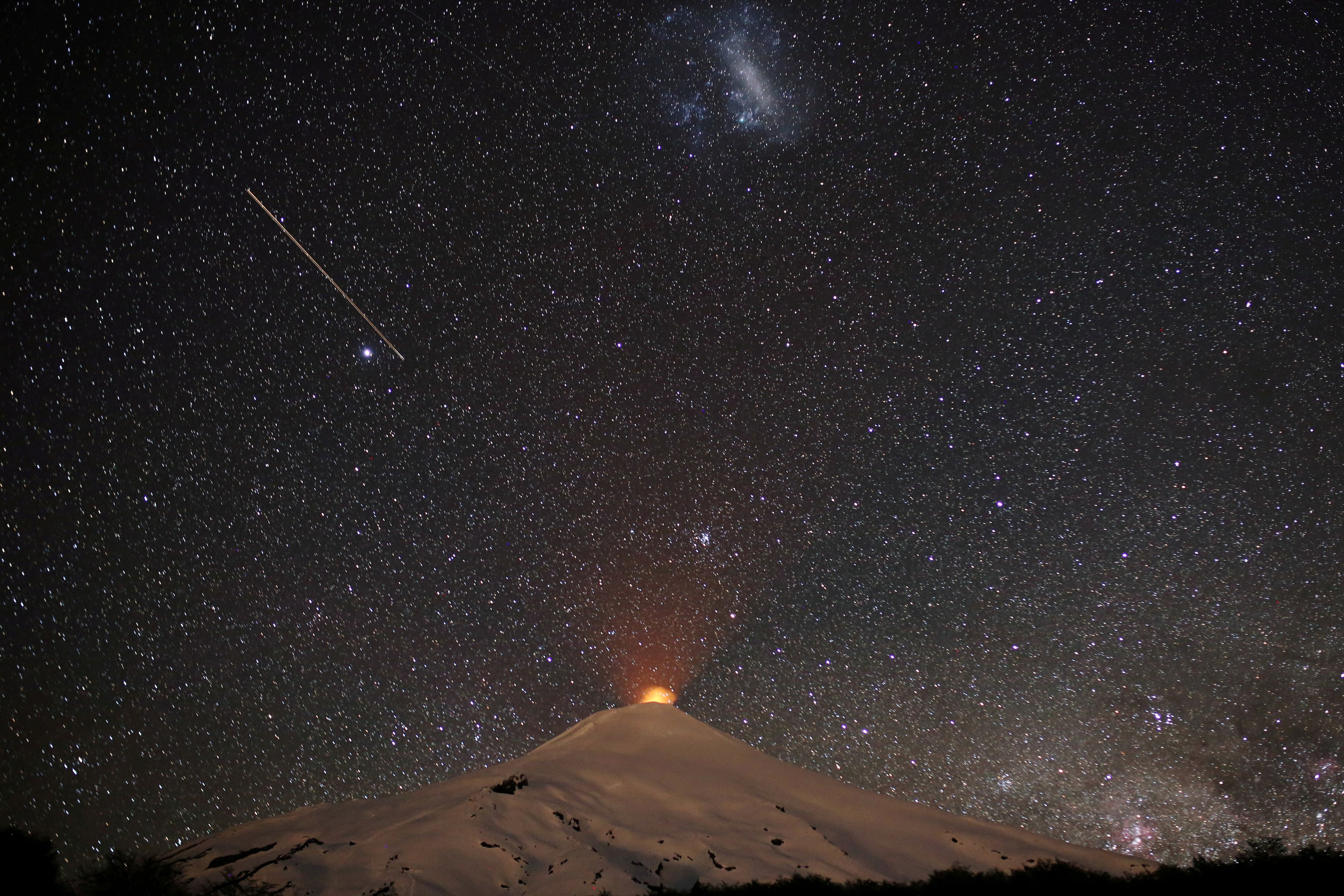 The Villarrica Volcano is seen at night from Pucon town