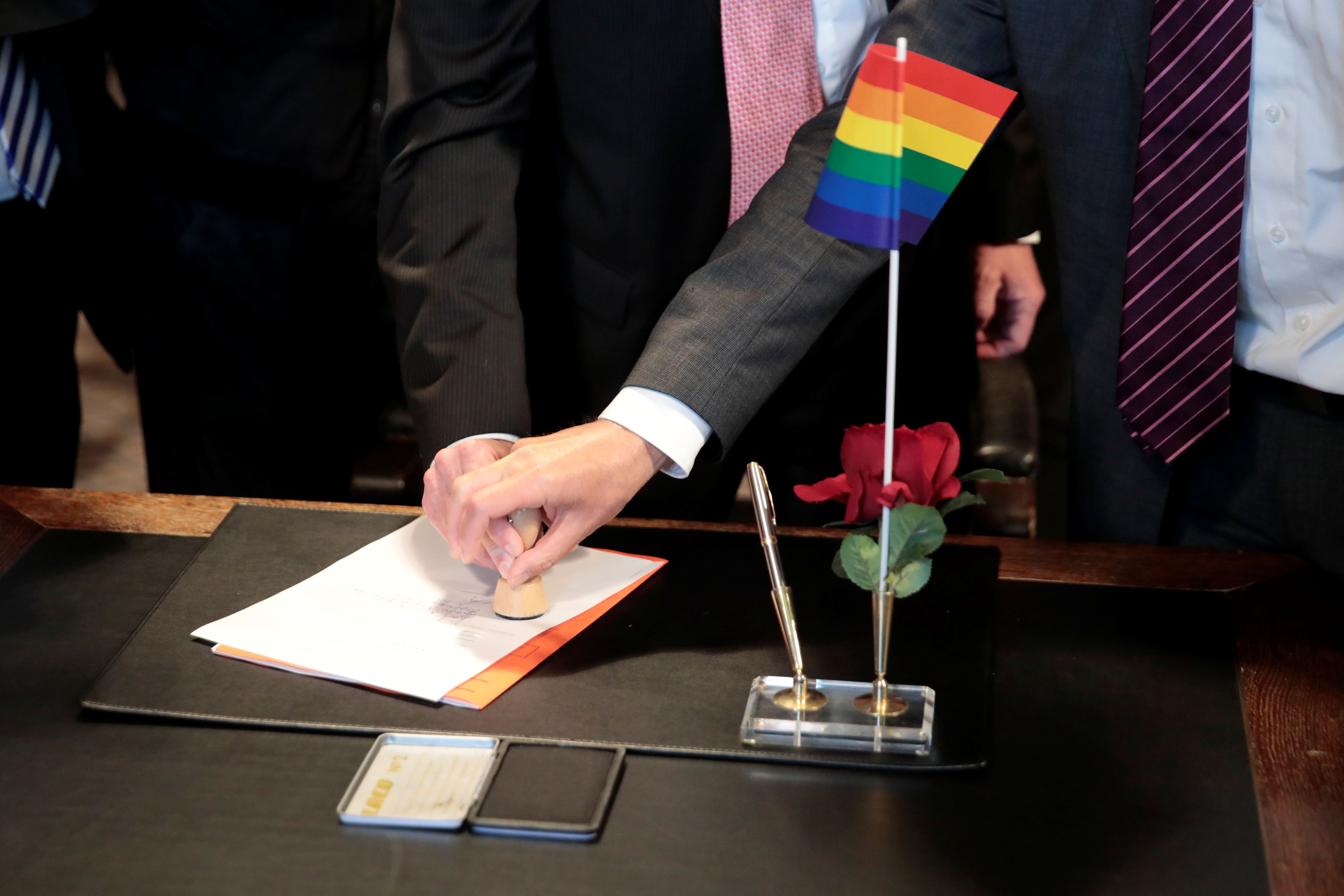 Same-sex couple Karl Kreil and Bodo Mende get married at a registry office after German parliament approved marriage equality in a historic vote this past summer, in Berlin