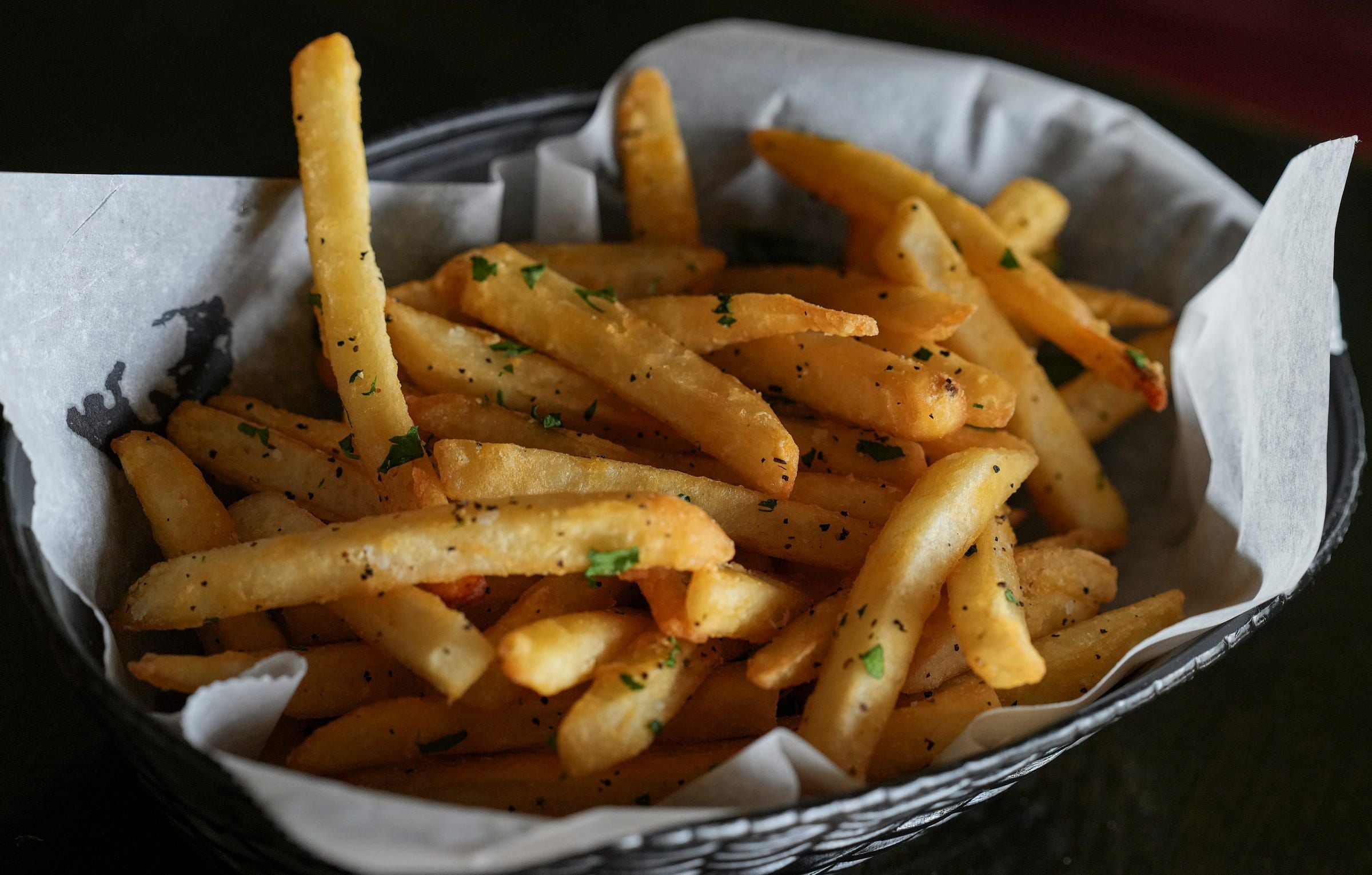 French fries are one of the most-loved items at Twenty Tap, pictured on Thursday, April 20, 2023, in the SoBro neighborhood of