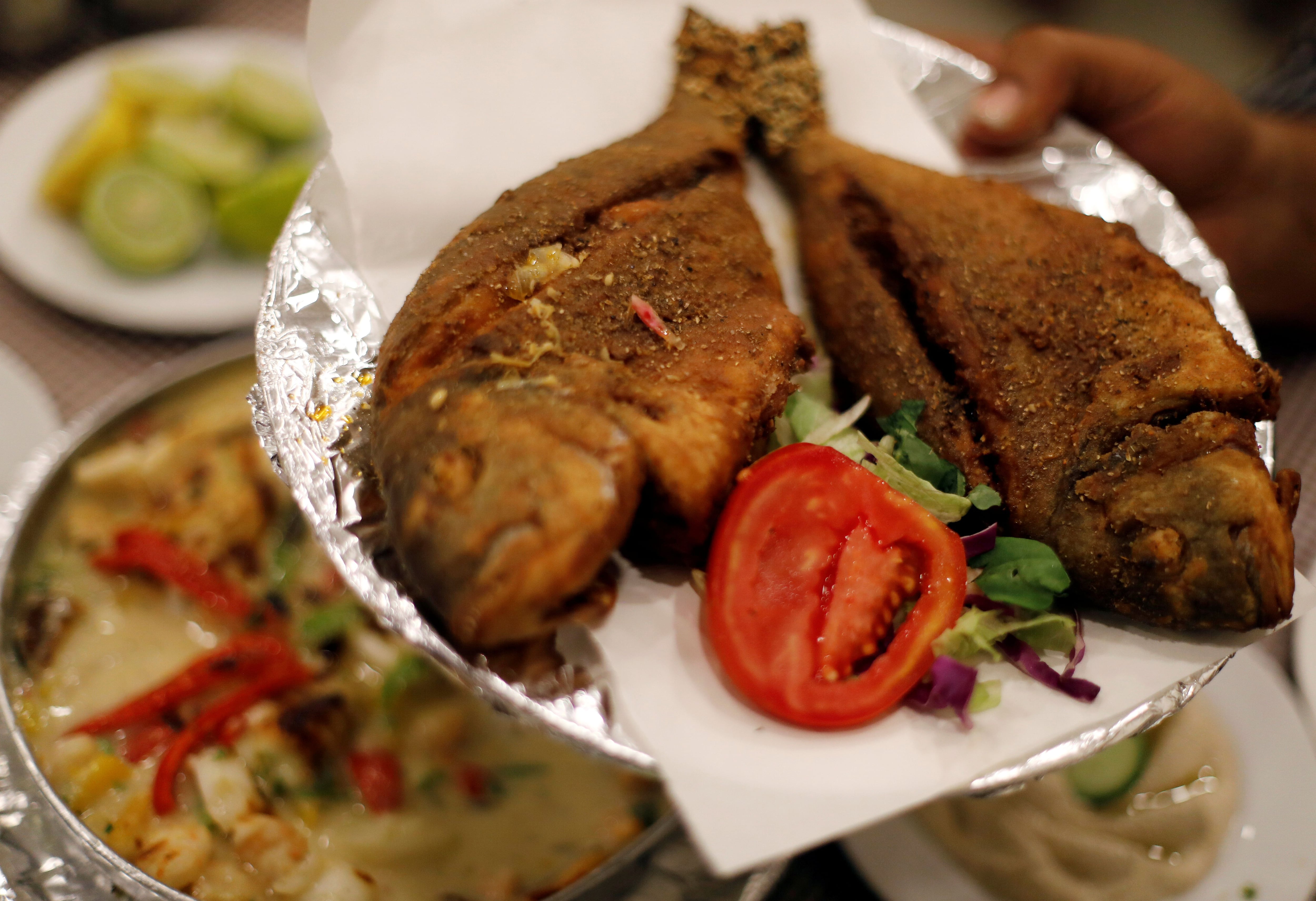 A plate of fried "Dennis" fish is pictured at Ibn Hamido seafood restaurant in Port Said city