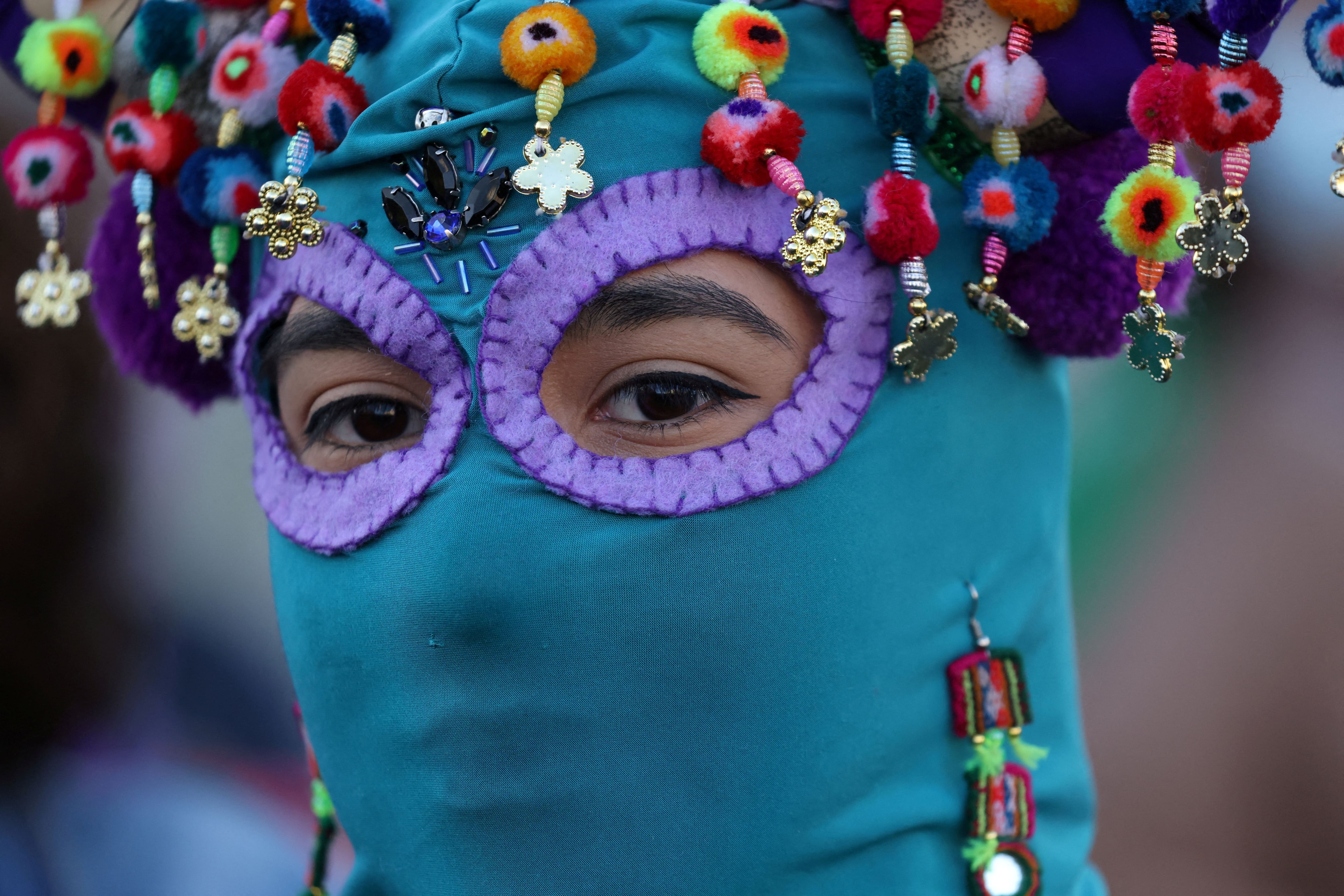 Women take part in a protest against gender violence and the Chile's government in Santiago