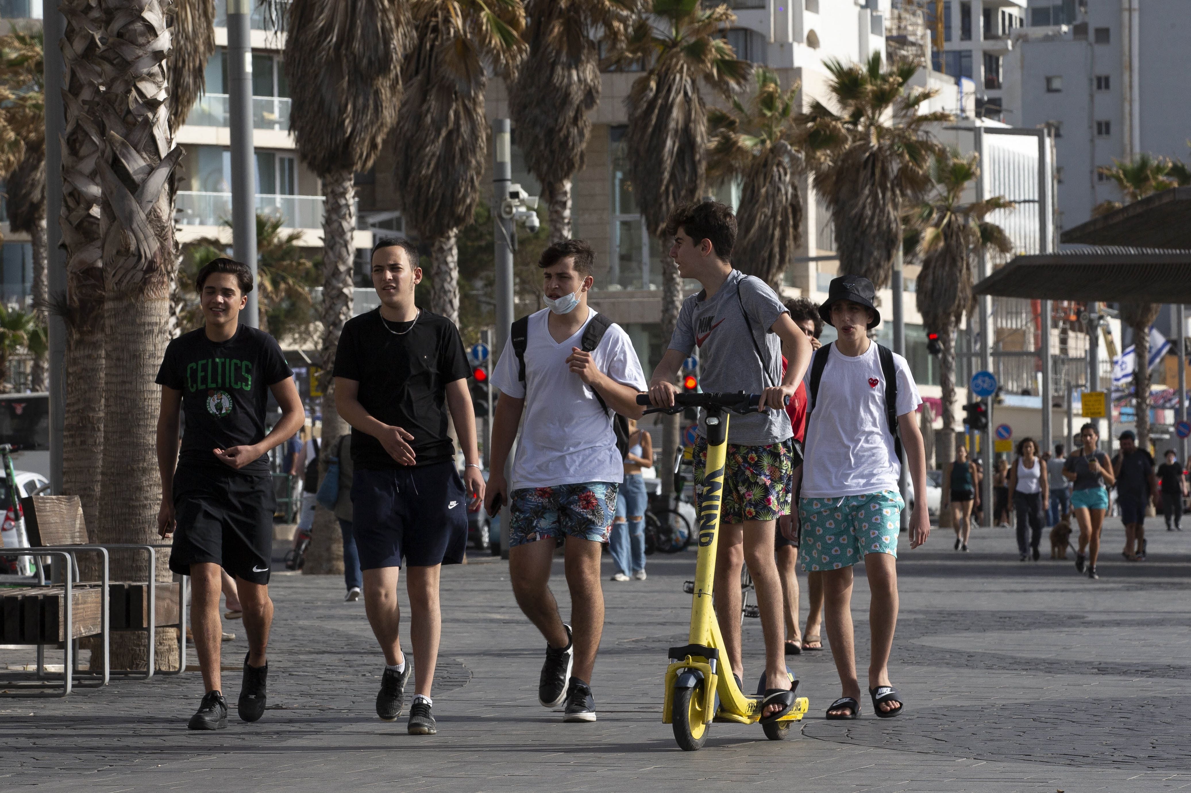 Israel lifts outdoor mask requirement, fully reopen schools