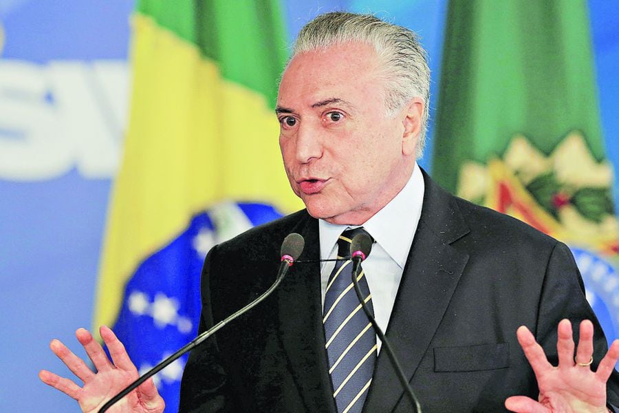 Brazil's President Michel Temer gestures during a ceremony to launch the Digital Platform of the Emprega Brasil Program, at the Planalto Palace in Brasilia