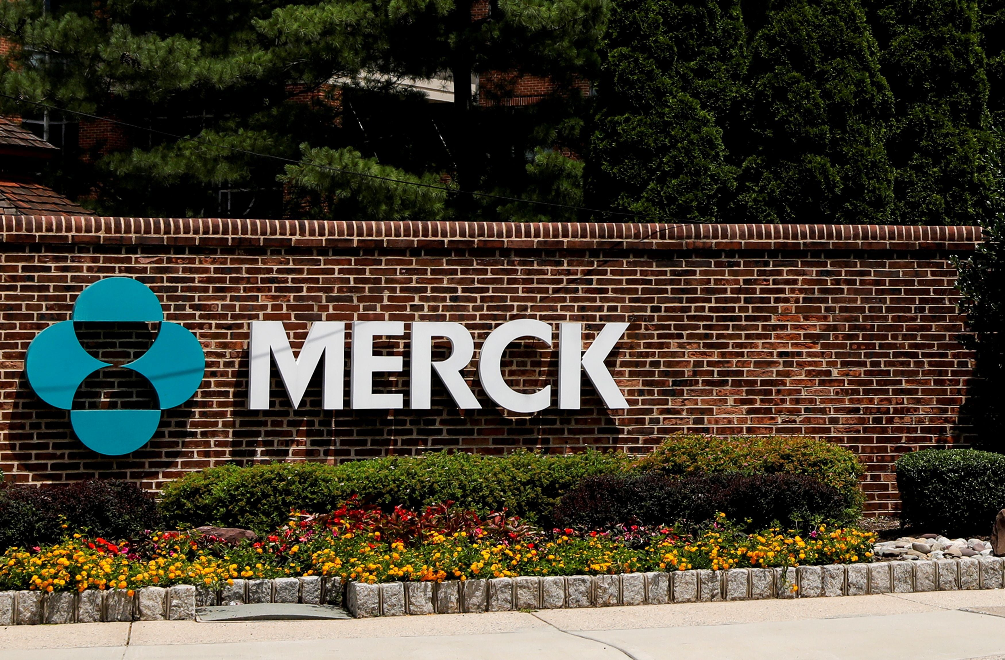 FILE PHOTO: FILE PHOTO: The Merck logo is seen at a gate to the Merck & Co campus in Rahway, New Jersey, New Jersey