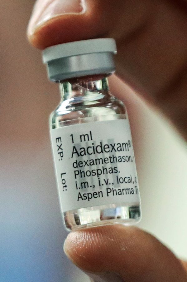 A pharmacist displays an ampoule of Dexamethasone at the Erasme Hospital amid the coronavirus disease (COVID-19) outbreak, in Brussels