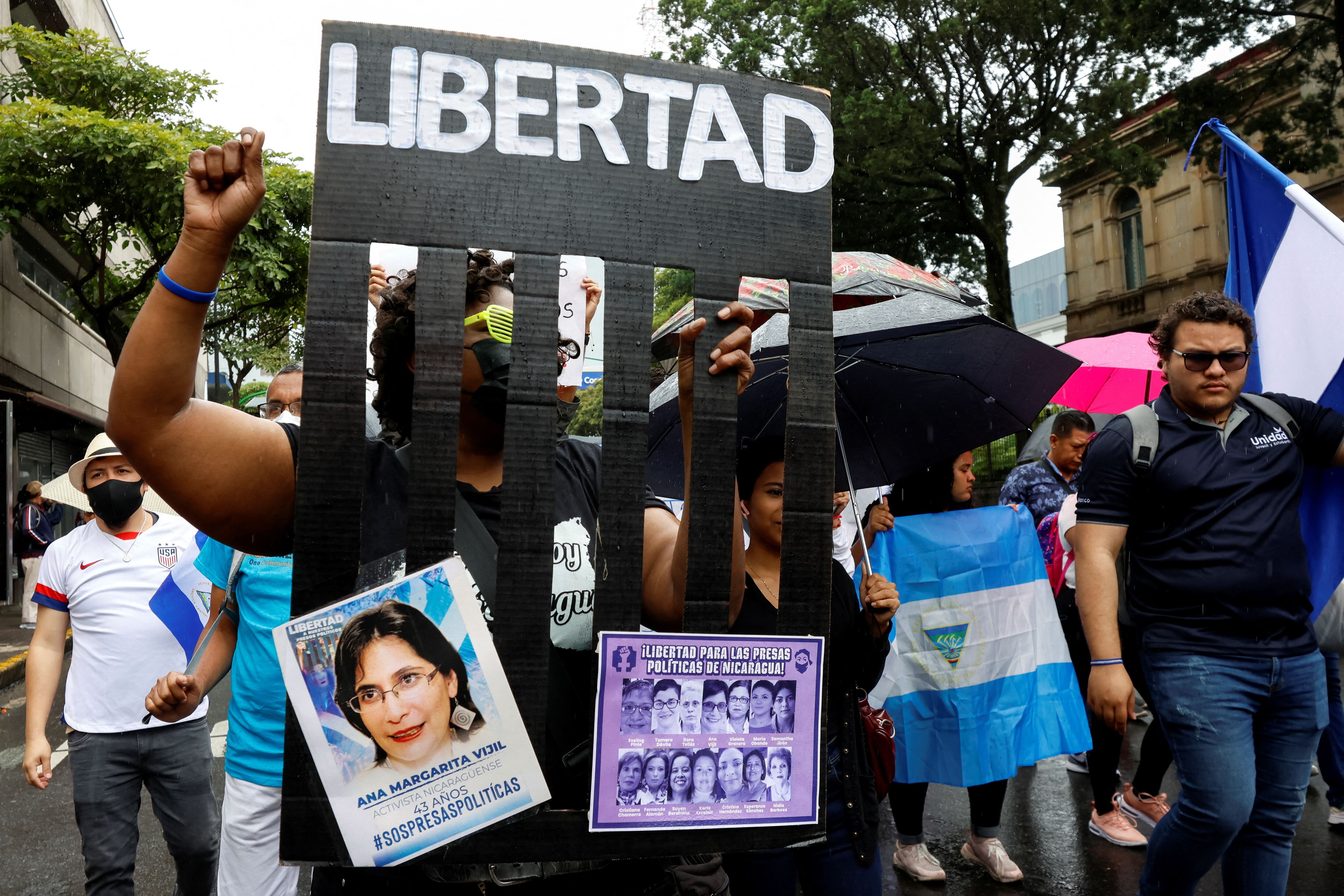 Nicaraguans exiled in Costa Rica protest against Nicaragua's municipal elections, in San Jose