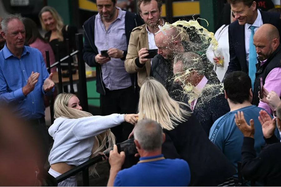 British populist Nigel Farage gets a milkshake in the face while launching his election campaign