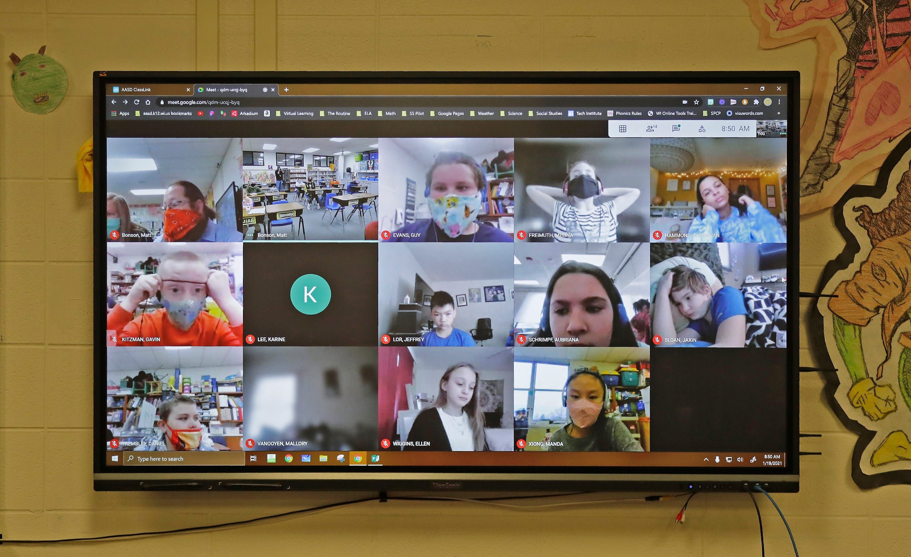 Half of the grade 5 students attend class virtually as students return to in person schooling at Highland Elementary on Tuesday,