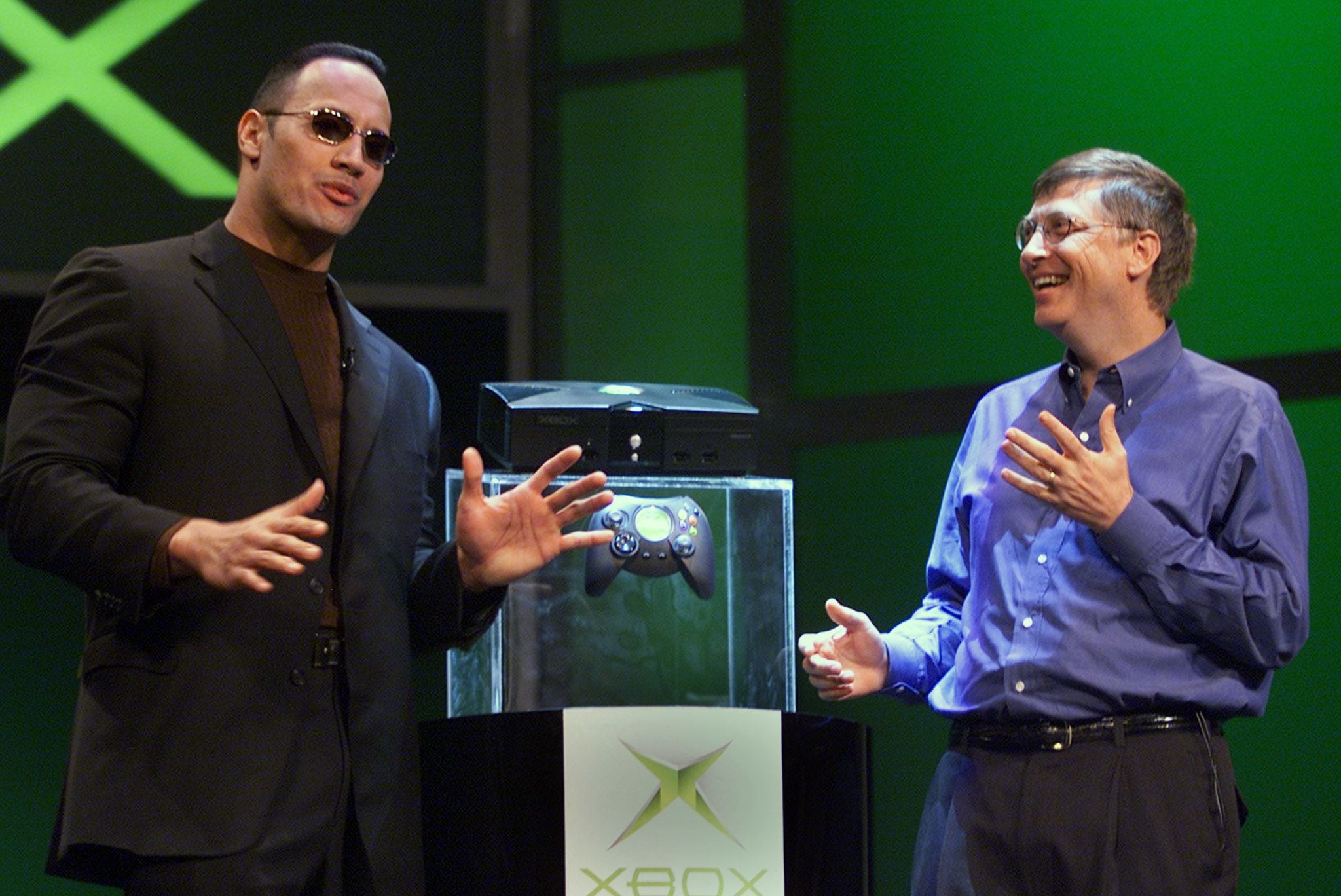 MICROSOFTS BILL GATES TALKS WITH THE ROCK IN LAS VEGAS.