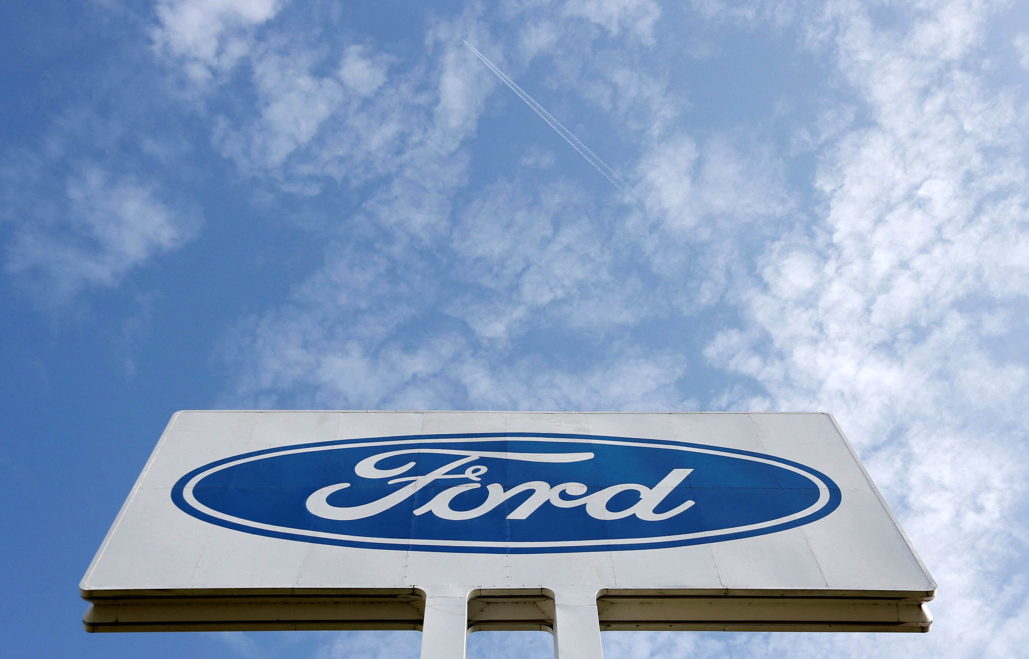 FILE PHOTO: The logo of Ford Motor Co is seen at the company's assembly plant after an emergency meeting with the plant management in Genk