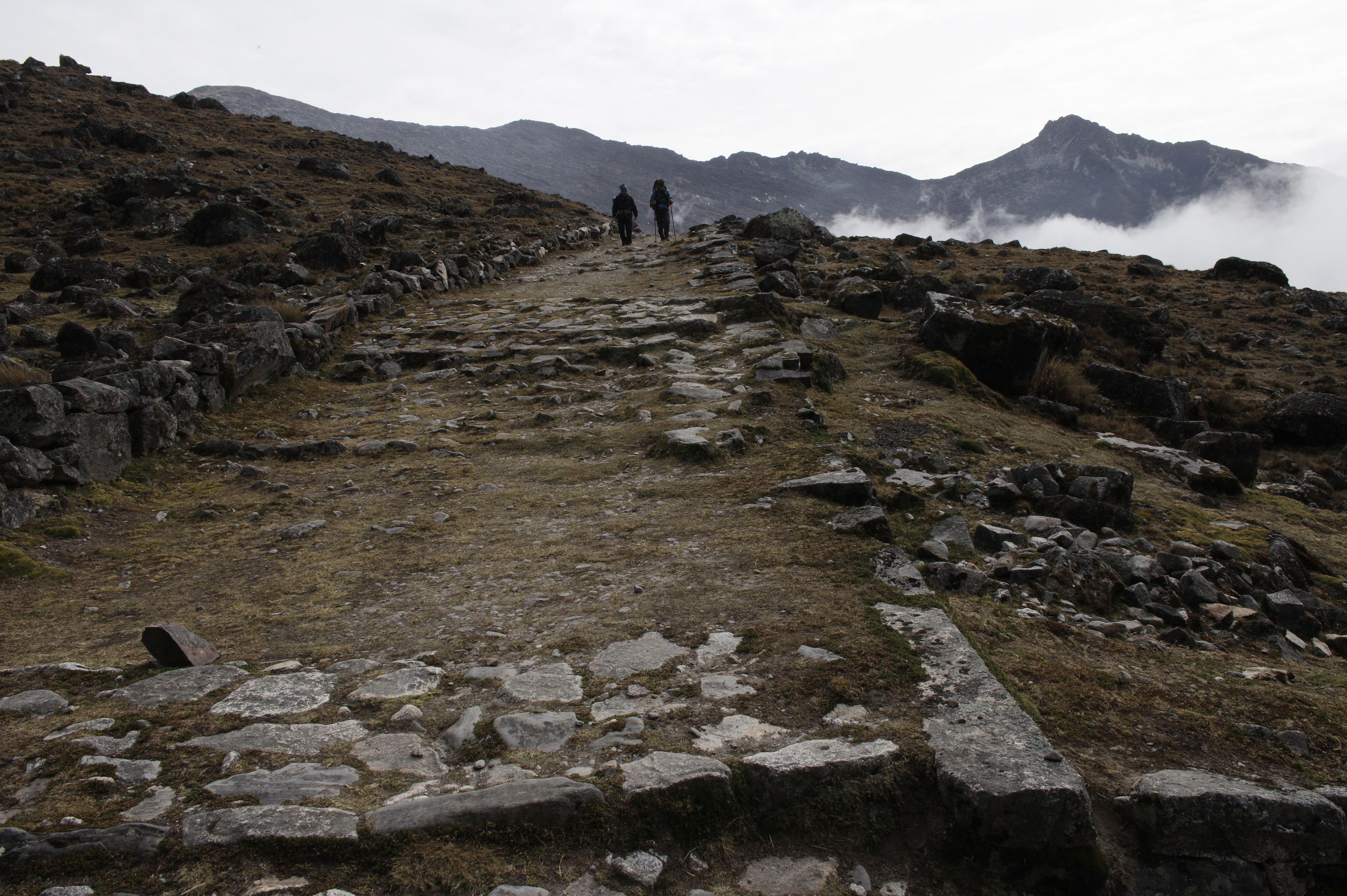 Hikers follow one of the best-preserved sections of the Inca road known as the Takesi trail