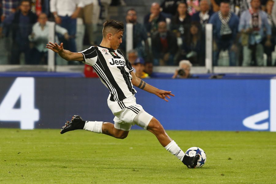 Juventus' Paulo Dybala shoots at goal