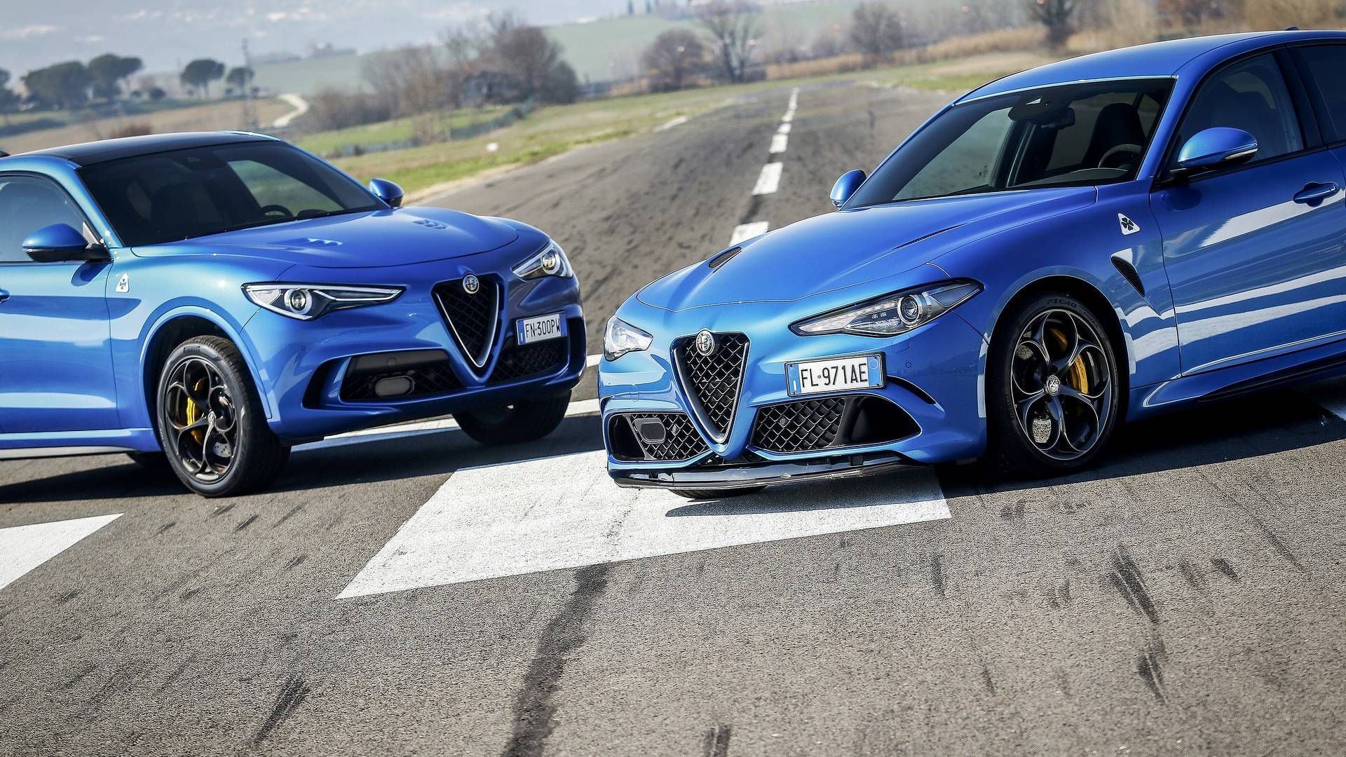 alfa-romeo-stelvio-vs-giulia-quadrifoglio-la-drag-race.jpg