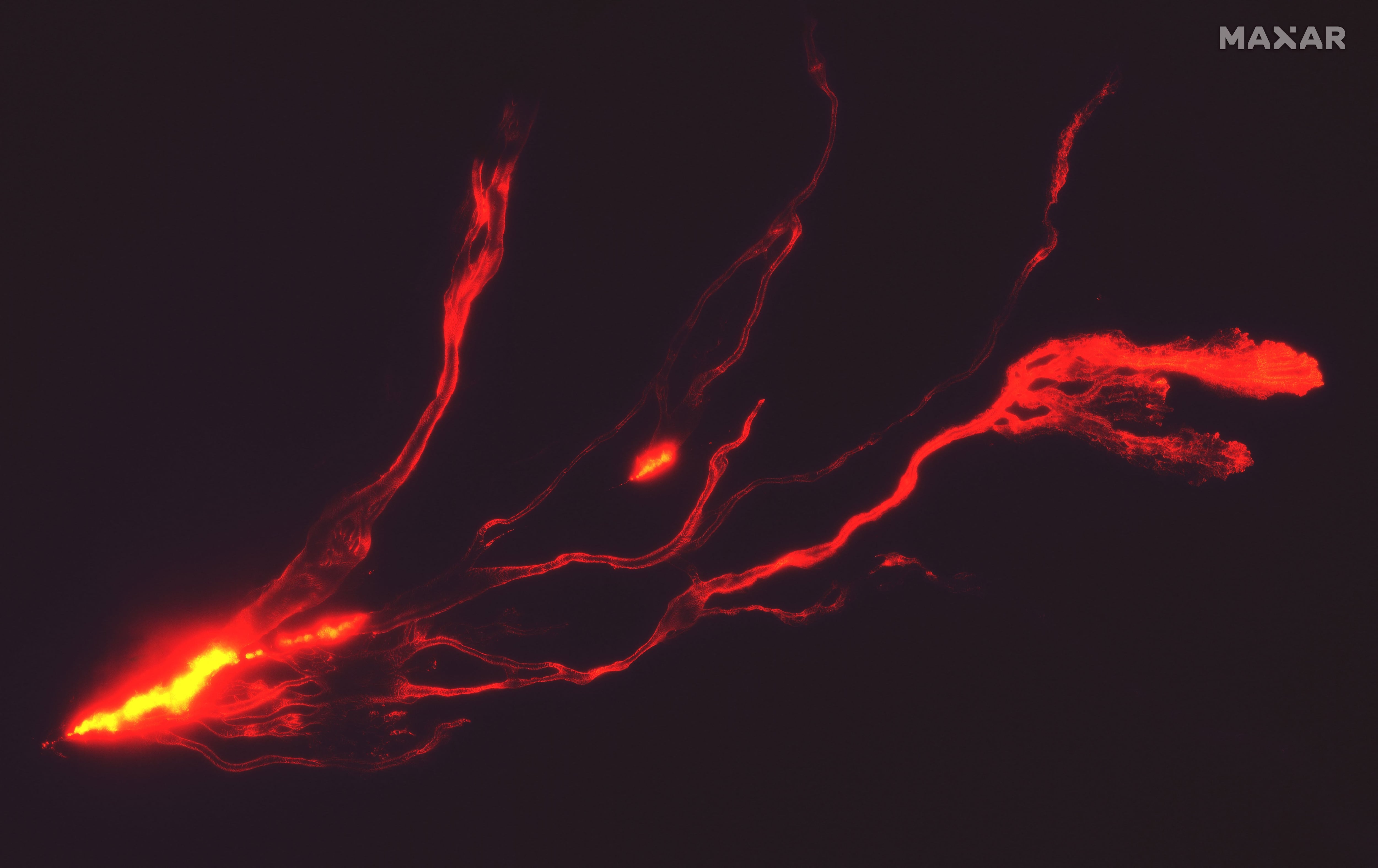 A satellite image shows lava flowing from Hawaii's Mauna Loa Volcano in Hawaii